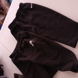 2 pairs of Nike sweatpants. Gently worn but in good condition! Size 24 mths